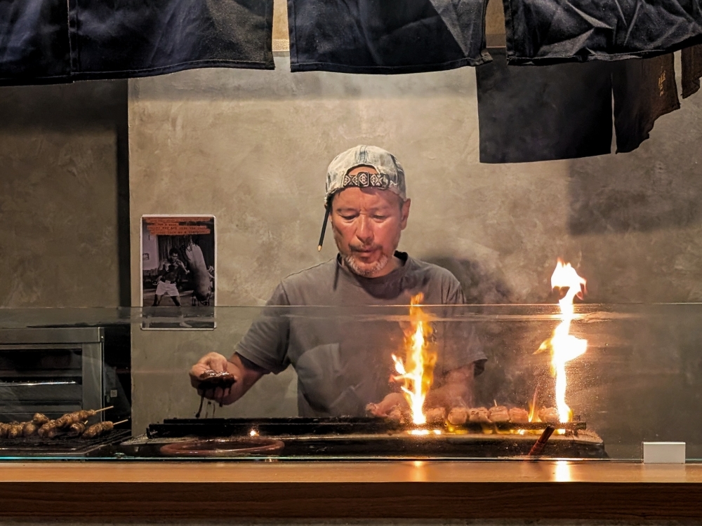 Chef Daiji Murasaki working the grill at his restaurant, Yakitori Lab Murasaki, in Solaris Mont Kiara. — Picture by Ethan Lau Chef Daiji Murasaki working the grill at his restaurant, Yakitori Lab Murasaki, in Solaris Mont Kiara. — Picture by Ethan Lau
