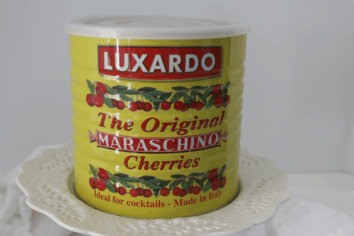 massive can of luxardo cherries -- how to best incorporate them into eggless/philly base?