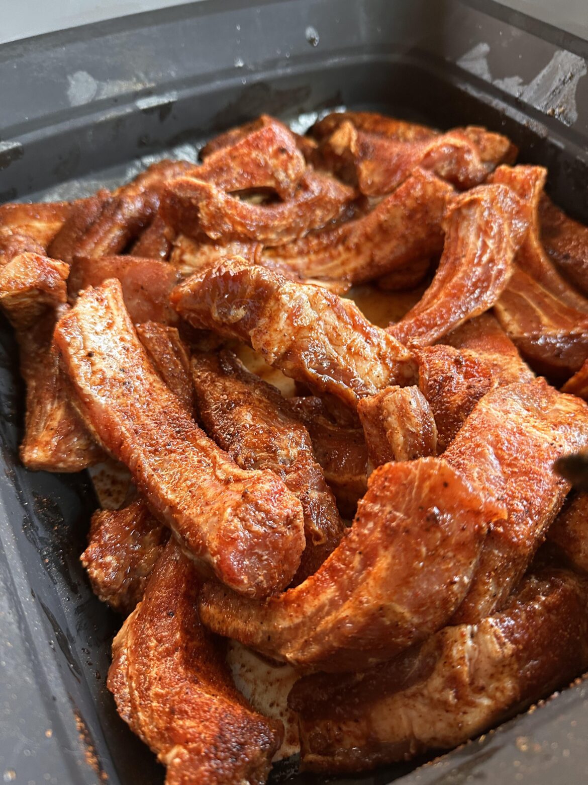 Party ribs soaking up some goodness before I grill them