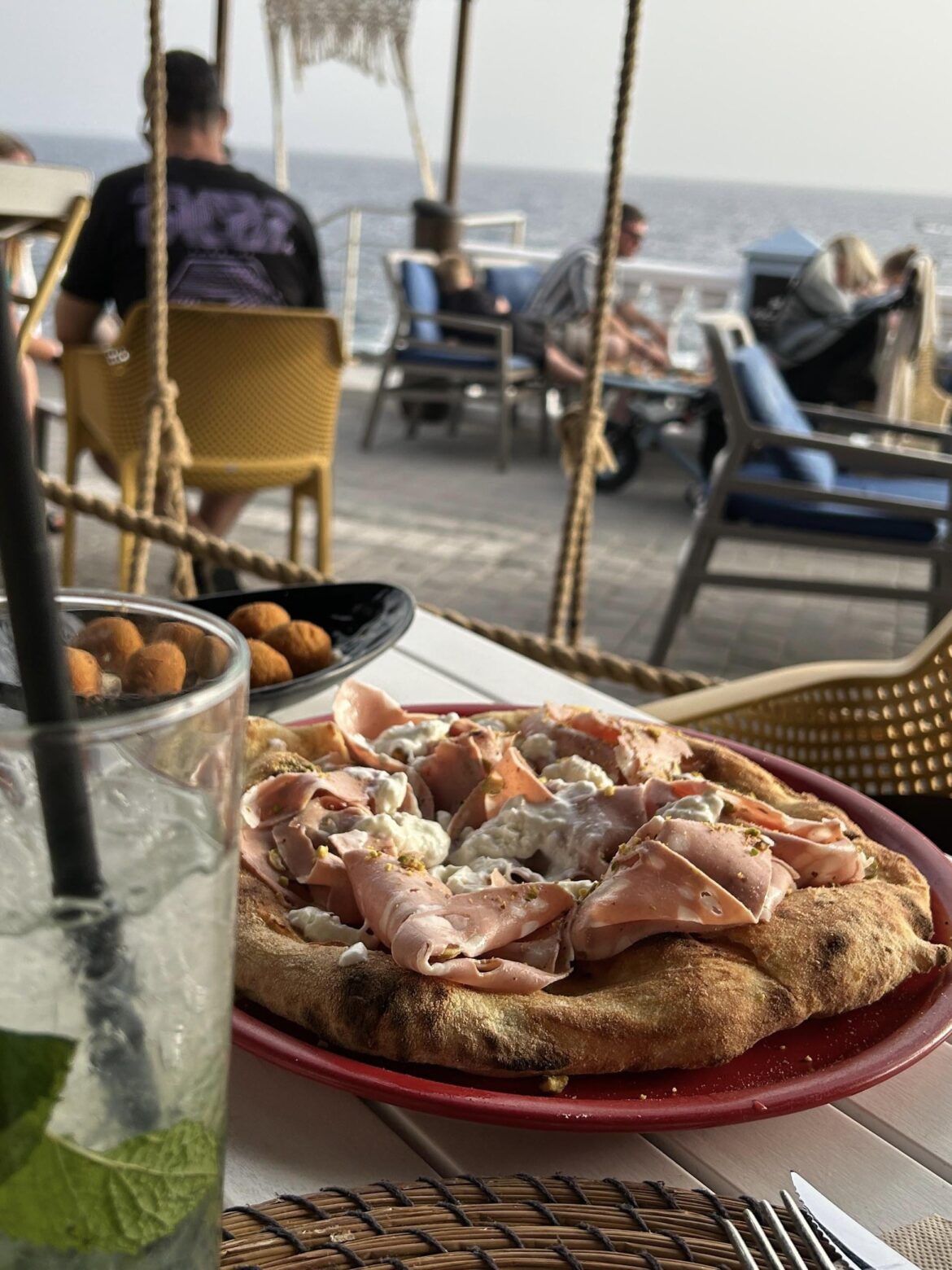 Pizza Mortadella, Stracciatella e Pistacchio with a view