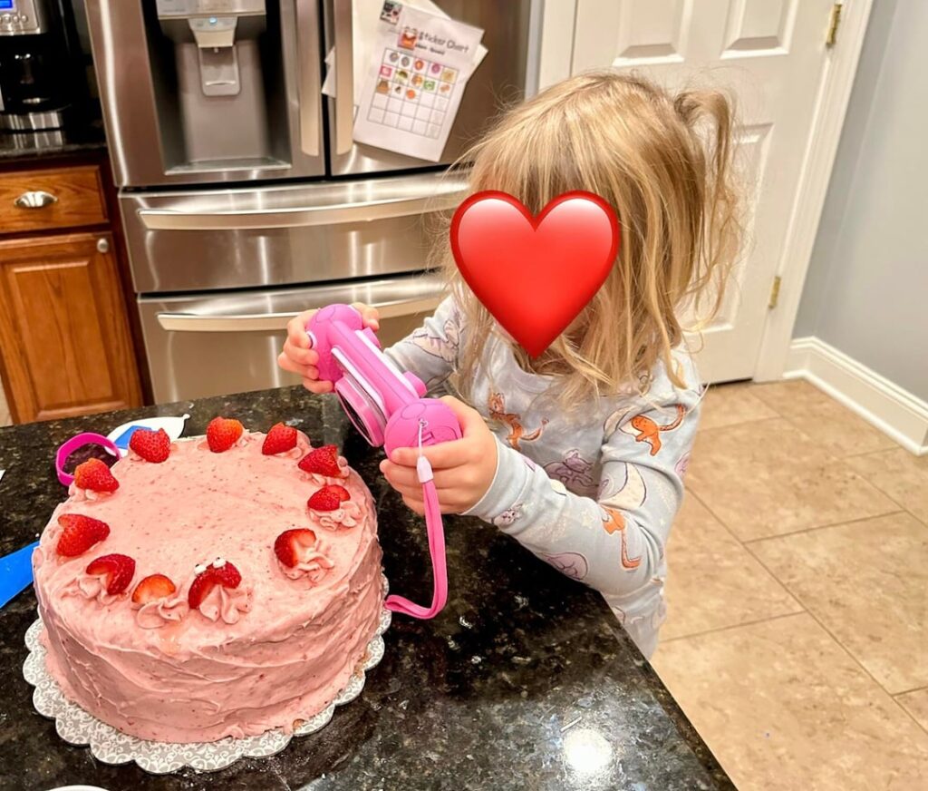 Made my daughter a strawberry birthday cake, and she was so enamored she wanted to take a picture of it 😭