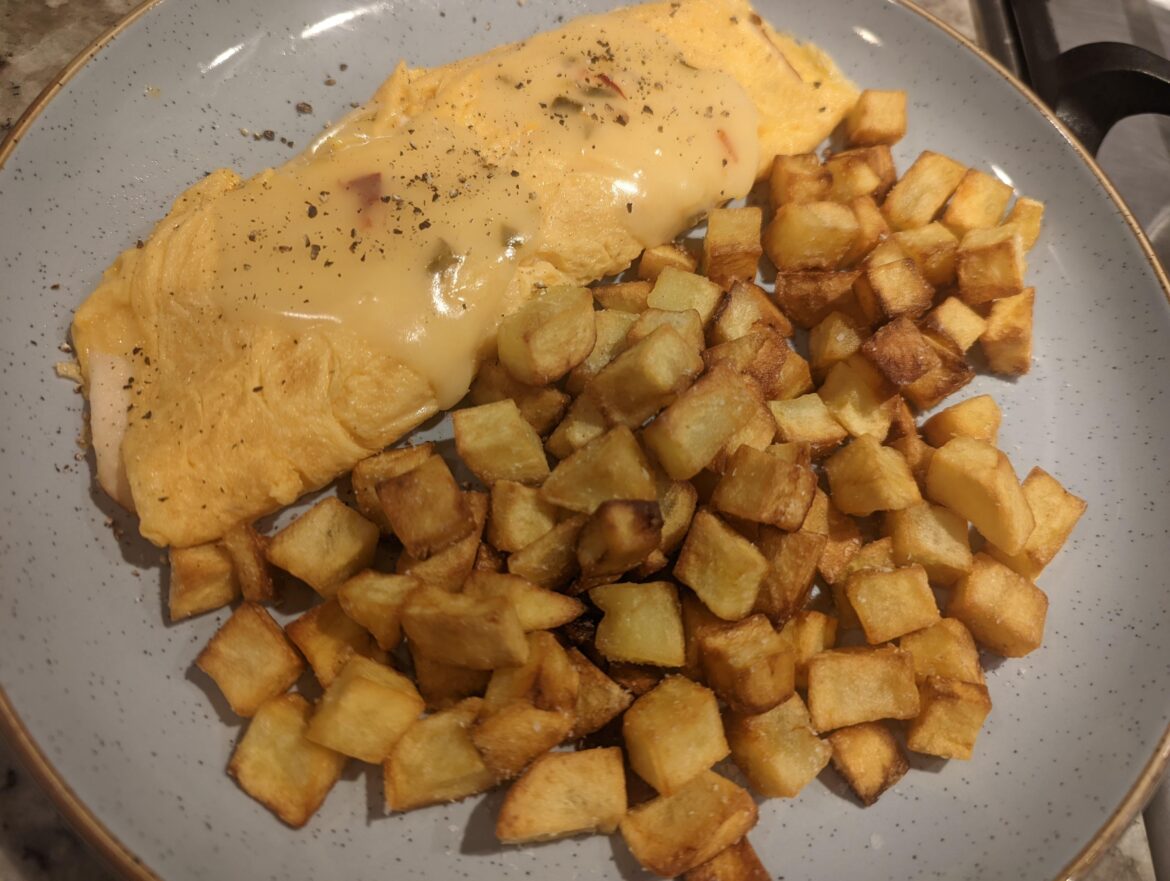 Chicken and Monterey Jack omelette with home fries