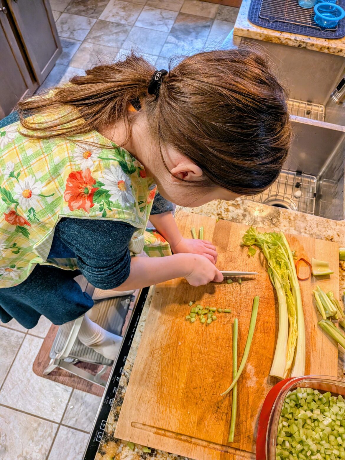 Starting her on celery, then we'll graduate to chives.