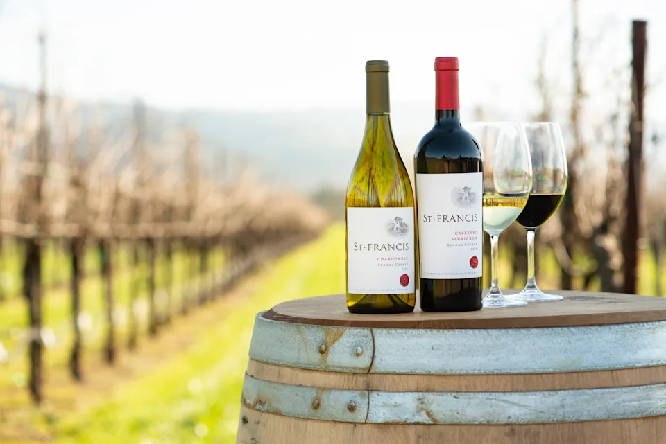 Bottle of Chardonnay and Cabernet Sauvignon in a vineyard