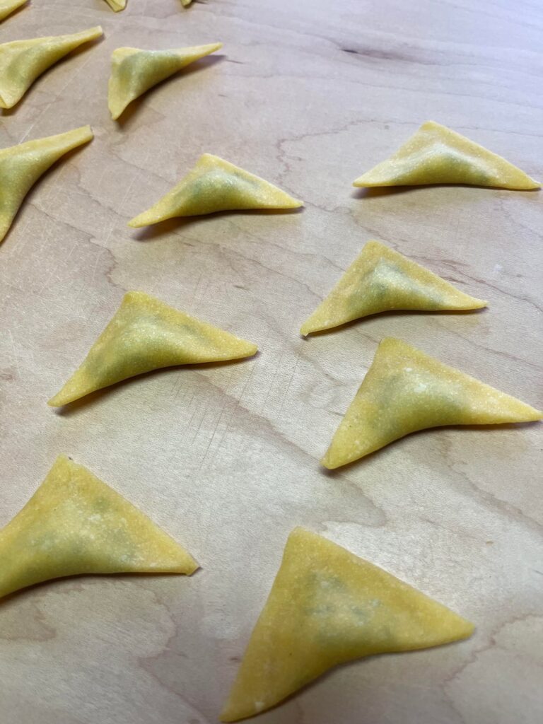 Triangoli with a tomato sauce and pecorino