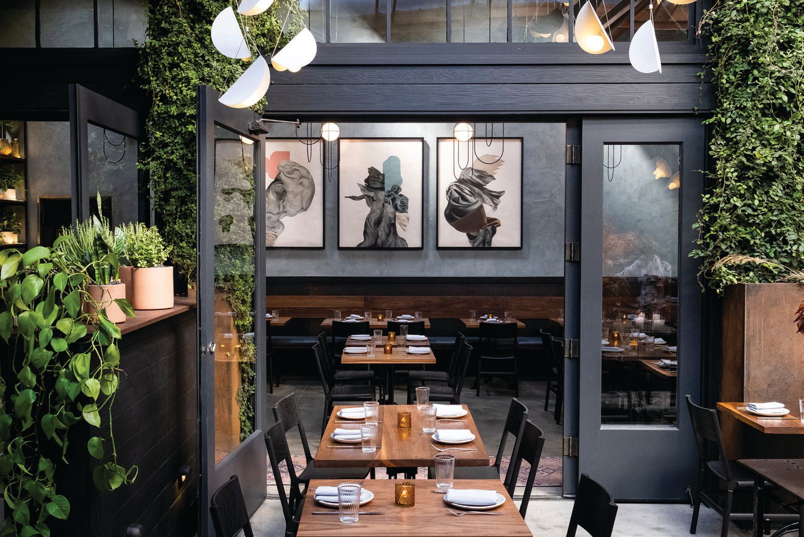 Penny Roma's courtyard and dining room PHOTO BY KRESCENT CARASSO