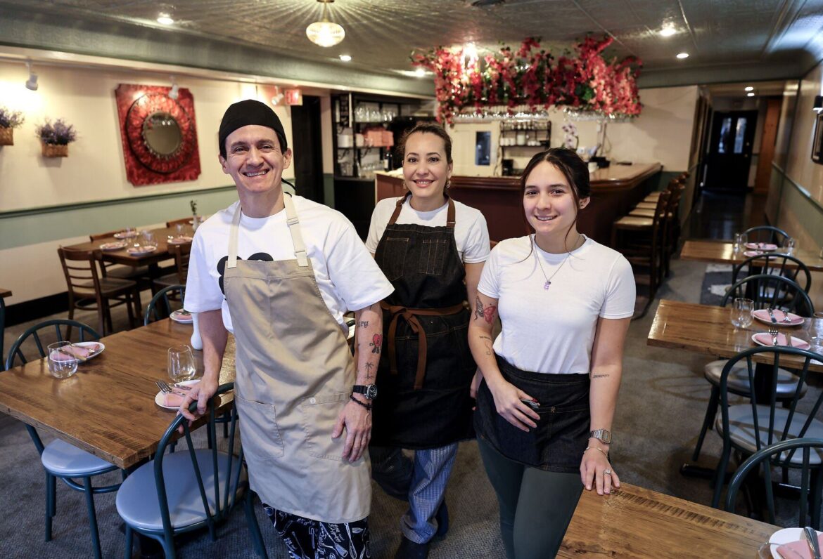 Gregory Pernia (left), his wife, Nacarith Marin, and daughter, Nathalia Pernia-Hefel, run the Caliza Mediterranean Cuisine in Galena, Ill.    PHOTO CREDIT: Dave Kettering