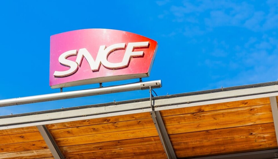 A view of the SNCF logo on a sign on a building