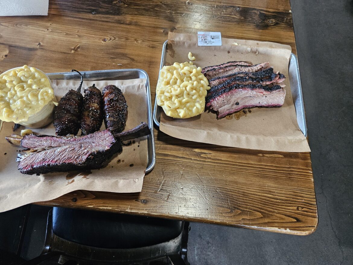 Hutchins Frisco. 146 dollars total for 1 pound moist brisket, 1 beef rib, 3 Texas Twinkies, one pint and one small Mac and cheese.  Free dessert peach cobbler with vanilla soft serve