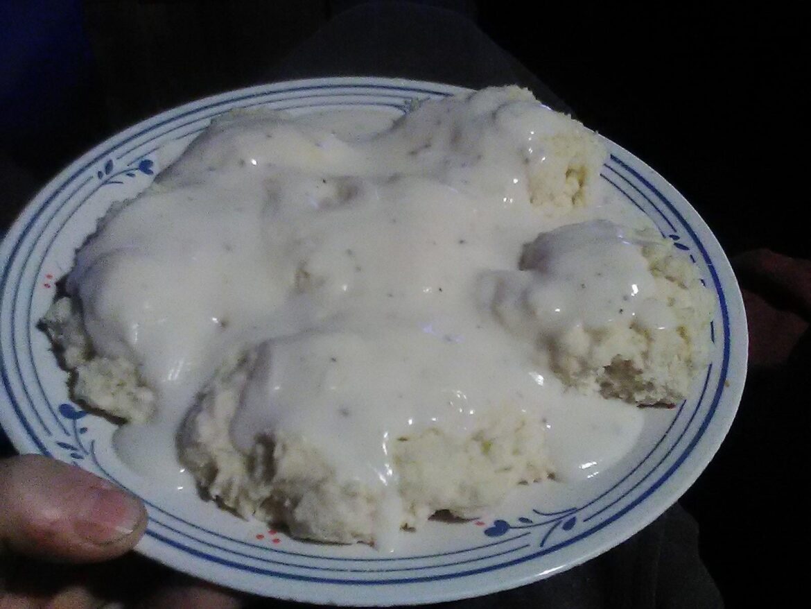This mornings ration: biscuits and gravy. 1 cup pancake mix with water to make a thick dough. Clumps placed in a dutch oven and baked till firm. 1 cup water and half a packet instant country gravy boiled in a stainless steel mug. Cheap and edible.