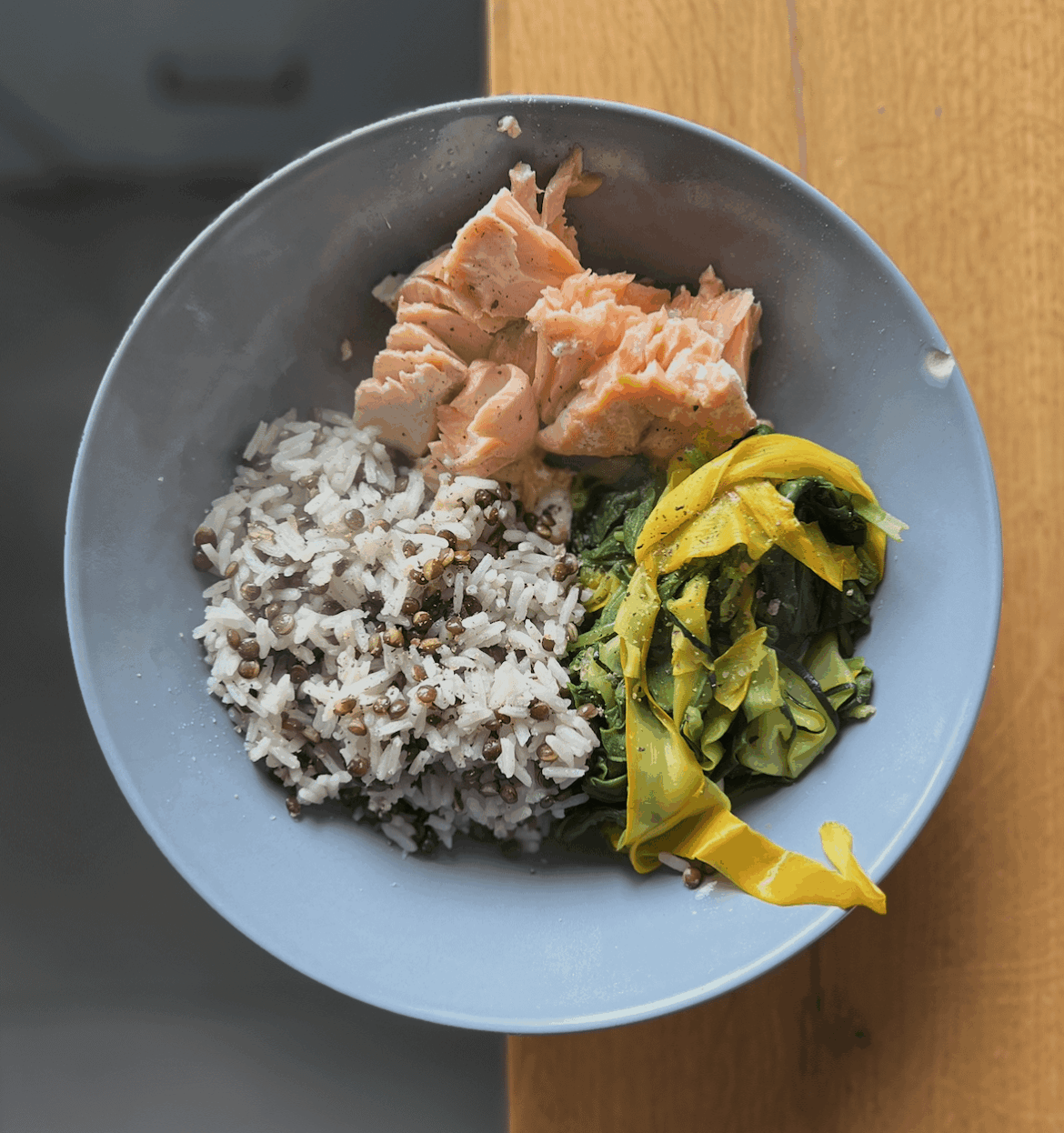 Rice with Black Lentils (Majadra Style) and Oven-Baked Salmon