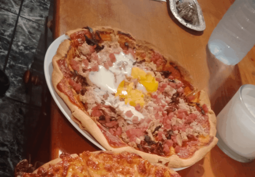 My boy eats the pizza without the unreliable cheese (ham, tomato, egg and bacon)