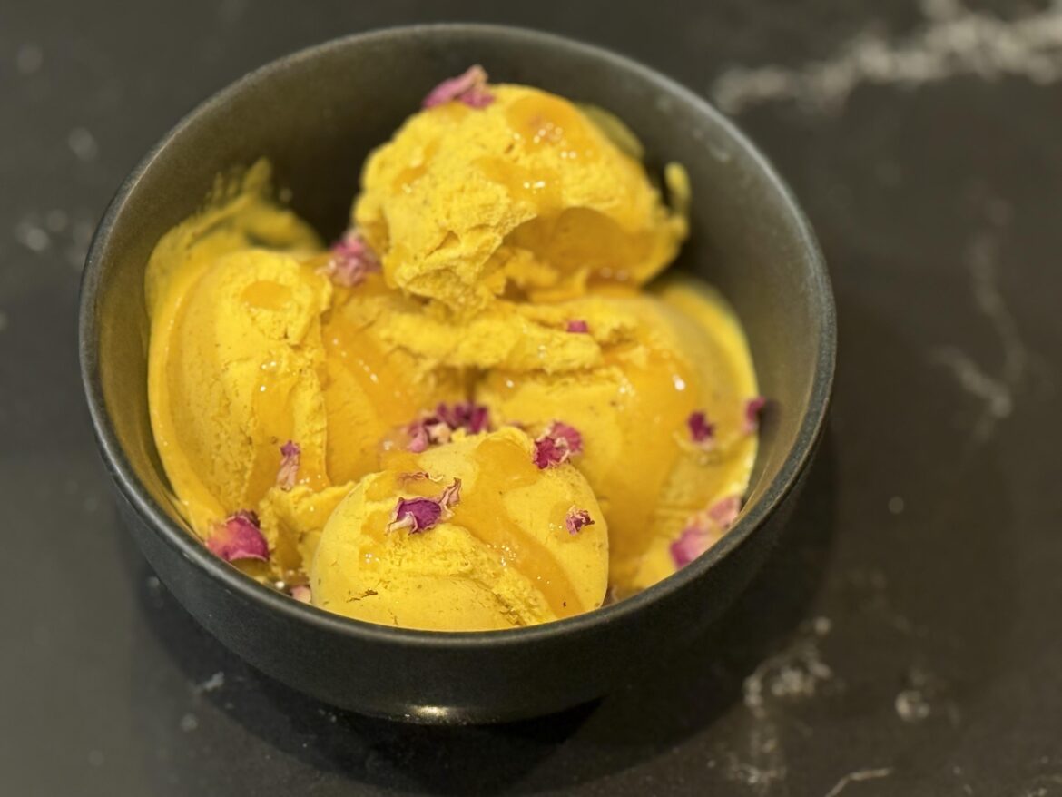 Saffron ice cream with honey and rose petals.