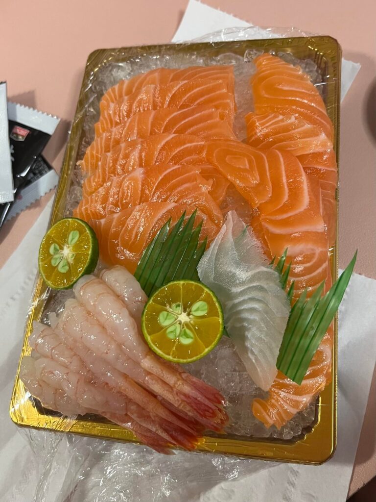 Trying salmon sashimi for the first time
