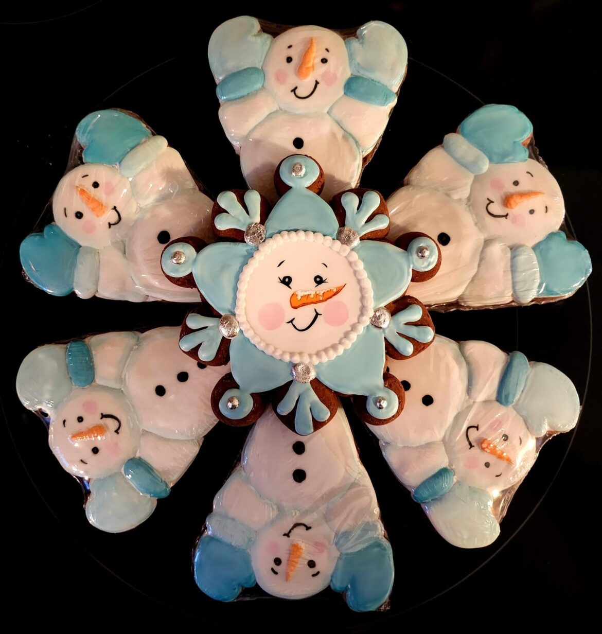 Gearing up for Christmas!  Gingerbread snowman and snowman snowflake platter.
