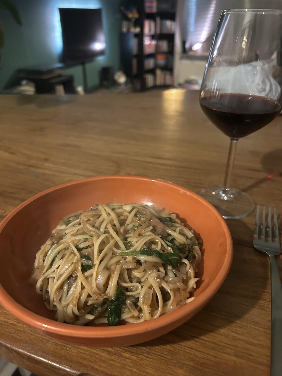 Homemade pasta with sardines, spinach and lemon
