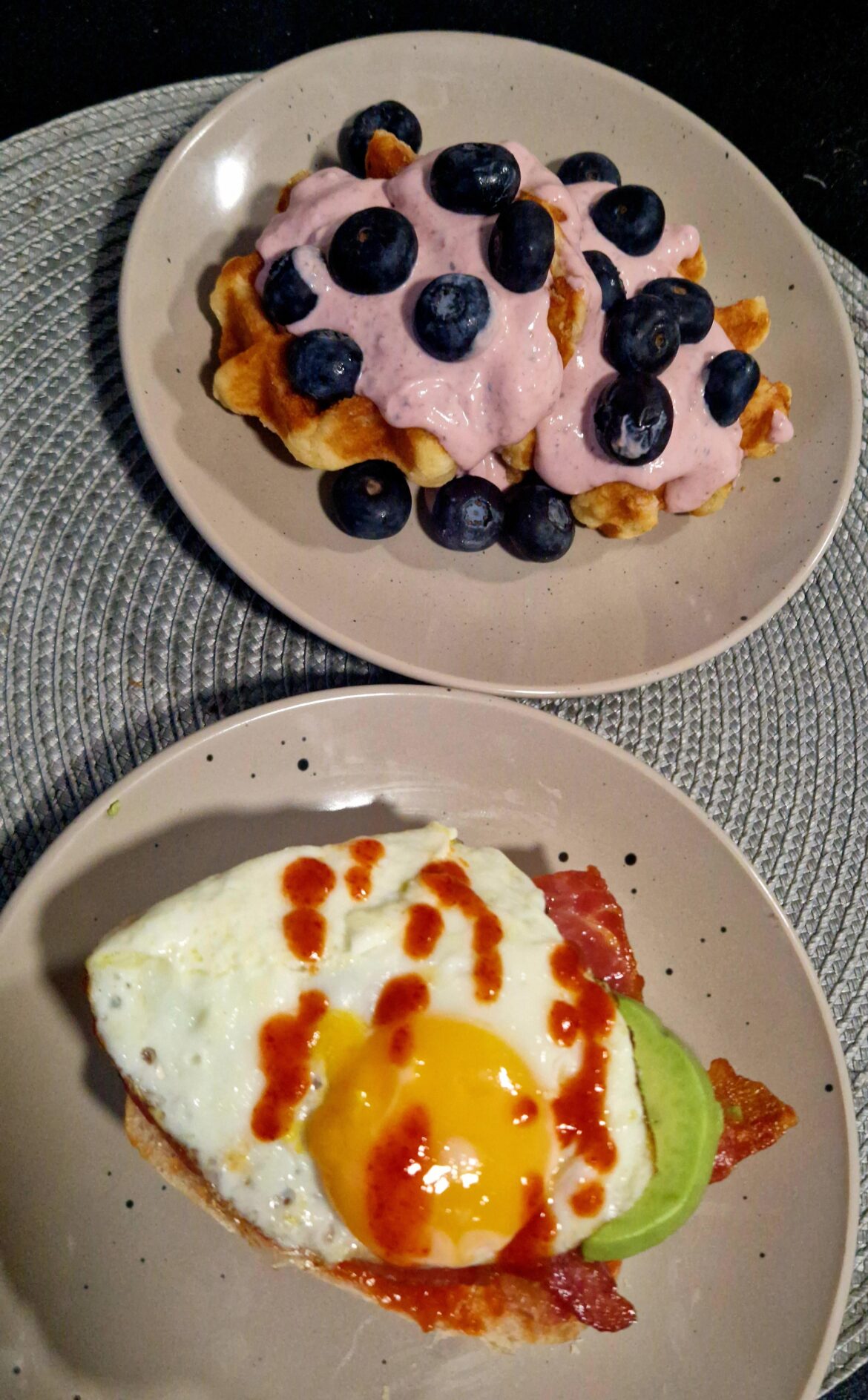 Bacon, avocado and egg ciabatta with blueberry and cream waffles. Bacon, avocado and egg ciabatta with blueberry and cream waffles.