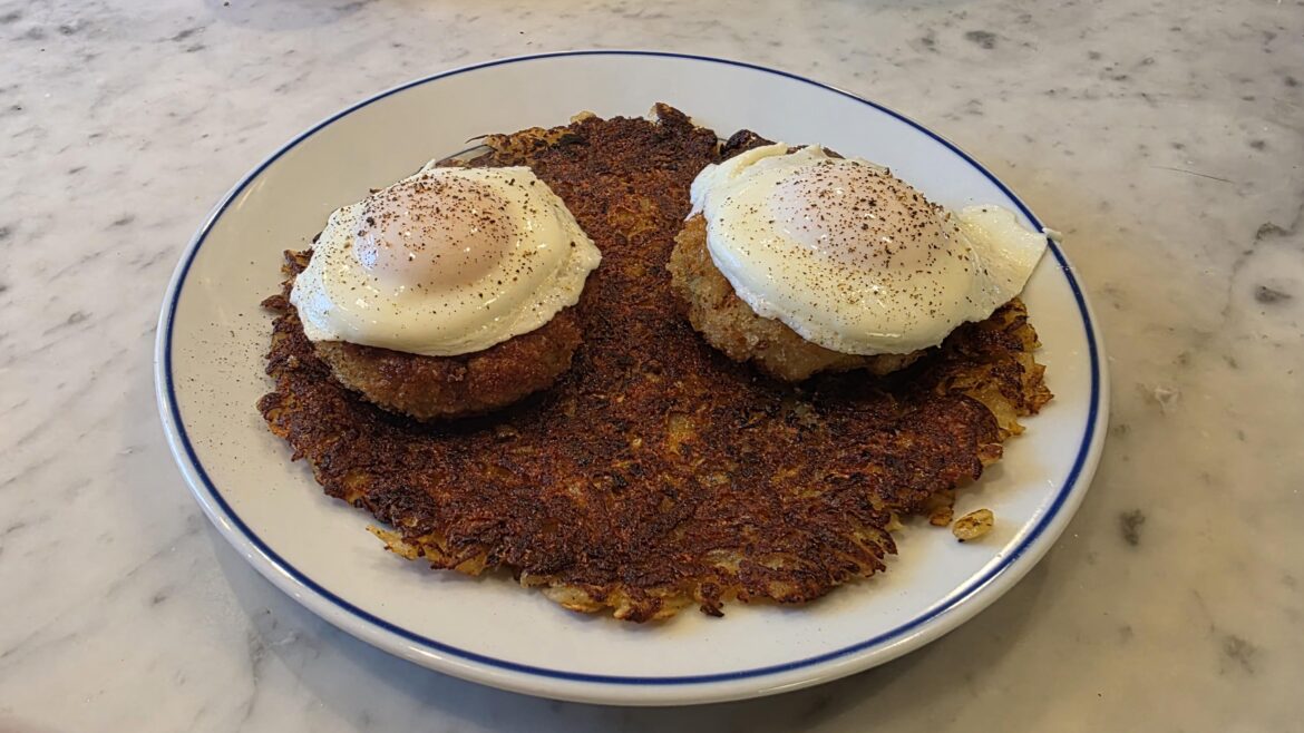 Easy eggs on scallop burgers over cheddar-garlic hash browns