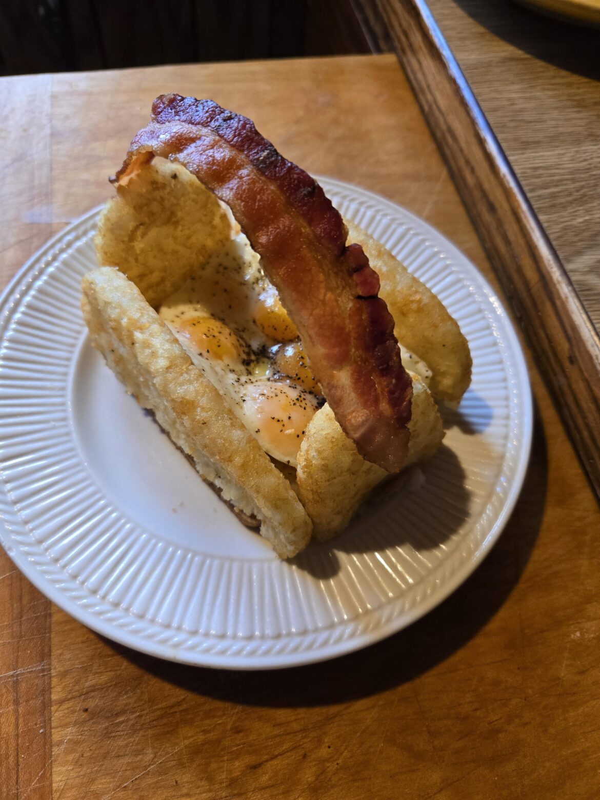 Quail eggs in a hashbrown basket
