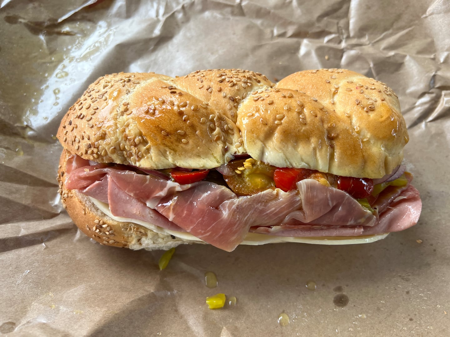 At Bob's in Medford, the Deluxe Italian with prosciutto di Parma, sopressata, capicola, mortadella, provolone, pickles, tomatoes, onions, hot cherry peppers, olive oil, and seasoning.