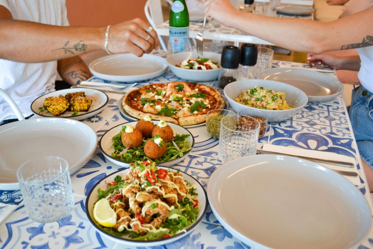 Grilled corn, Zucchini prawn pizza, Caprese salad, Fettuccine boscaiola, Calamari fritta & Arancini balls, Toro's Pizza (Image: © 2022 Inside Gold Coast)