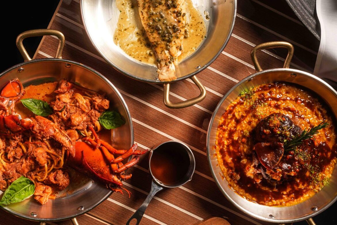 Family-style dishes at La Salière. Photo courtesy of at La Salière