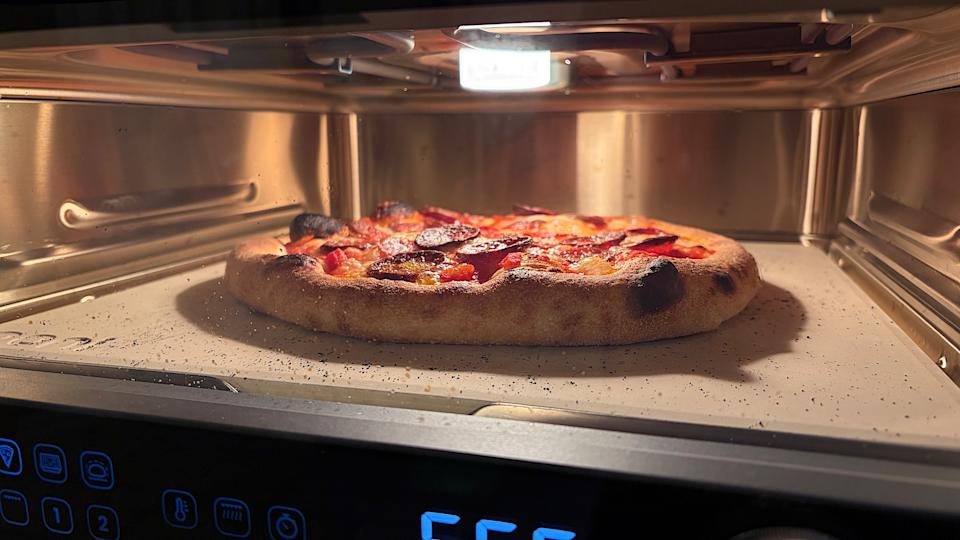 New York-style dough is baking with the Thin & Crispy preset on the Volt 2.