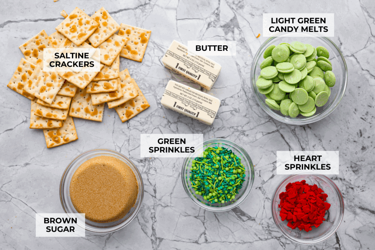 Overhead shot of labeled grinch Christmas crack ingredients. 