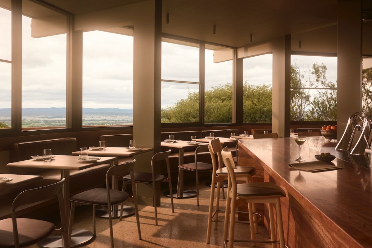 Interior of restaurant during golden hour.