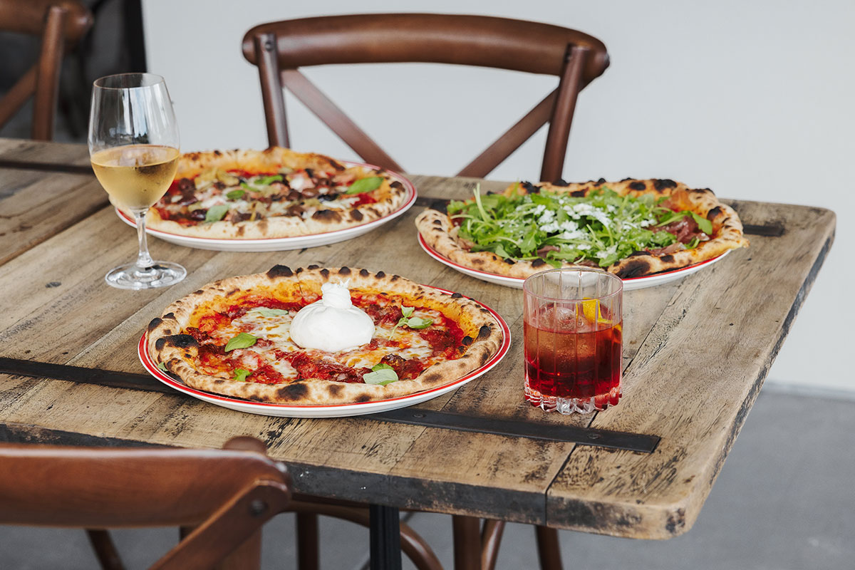 Pizzas at Papa Rolly's, Carrara (Image: © 2025 Inside Gold Coast)