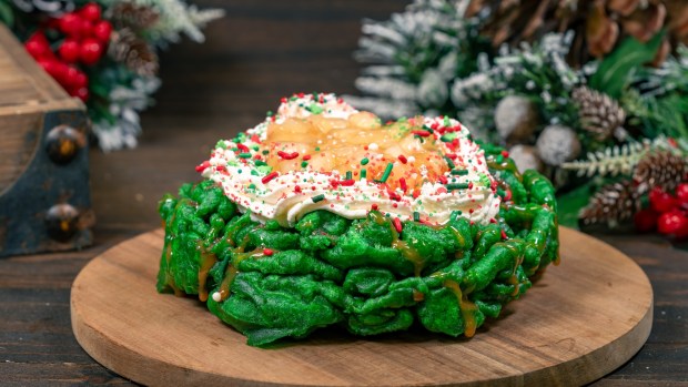 Wreath Funnel Cake available at Stage Door Cafe on the new holiday menu at Disneyland. (Courtesy of Disneyland)