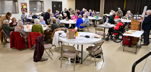 People gathered around tables