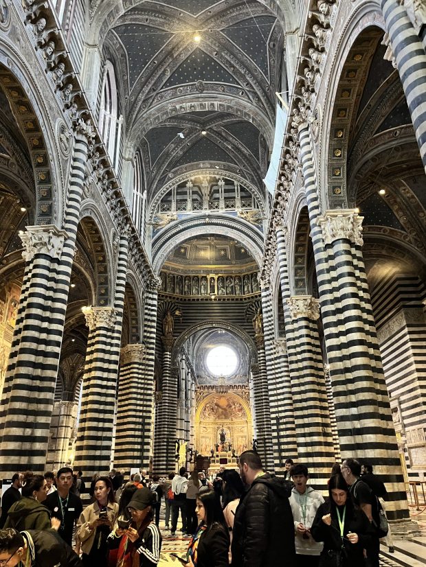 Black-and-white striped columns line a church