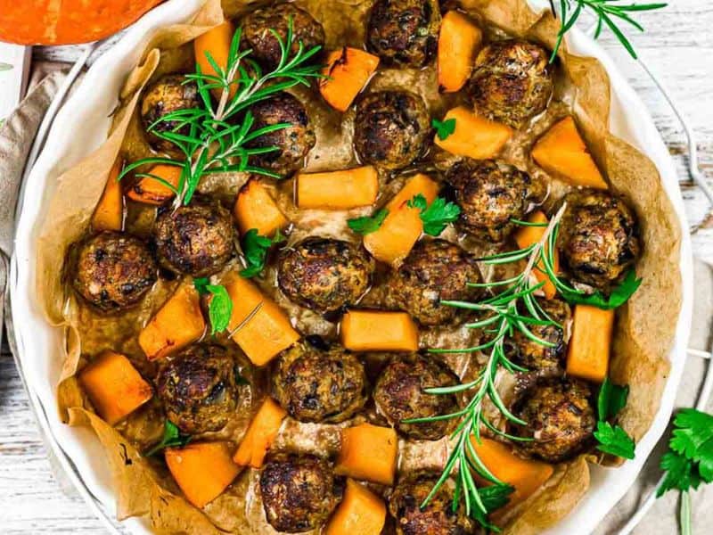 Pumpkin meatballs with baked pumpkin pieces.