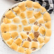 s'mores cheesecake topped with toasted marshmallows