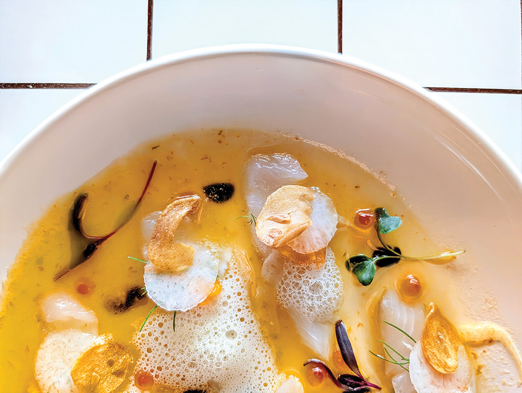 The Aurora Crudo at Junah • Salt Lake Magazine Striped Jack Aurora crudo with fennel and mandarins.