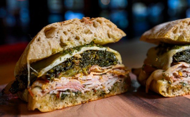 Roma, classic Italian sandwich featuring local sourdough ciabatta, porchetta, provolone,...