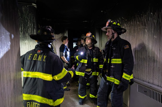FDNY inspecting the damage from a fire where ten individuals were injured, two critically, on the third floor of a six story residential building at 1166 Grand Concourse in the Bronx, Tuesday, Nov. 4, 2025. (Shawn Inglima/ New York Daily News)