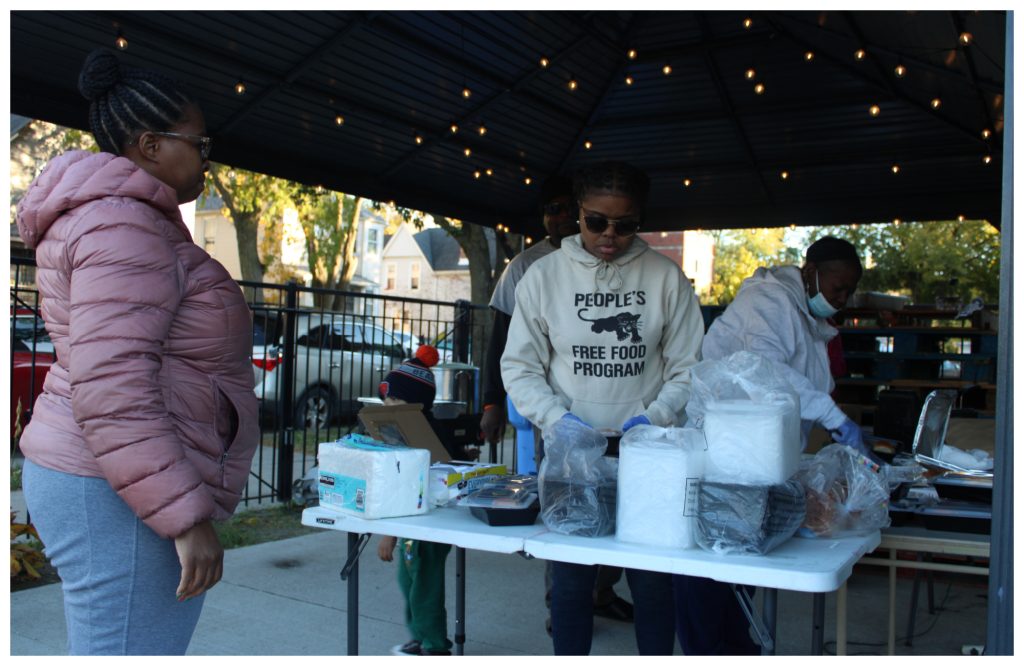 Tiny Kitchen Project volunteer Renita Gayles (l) and MASK founder Tamar Manasseh prepare meals for kids and families at the MASK Peace Academy in Englewood Nov. 3, 2025.
