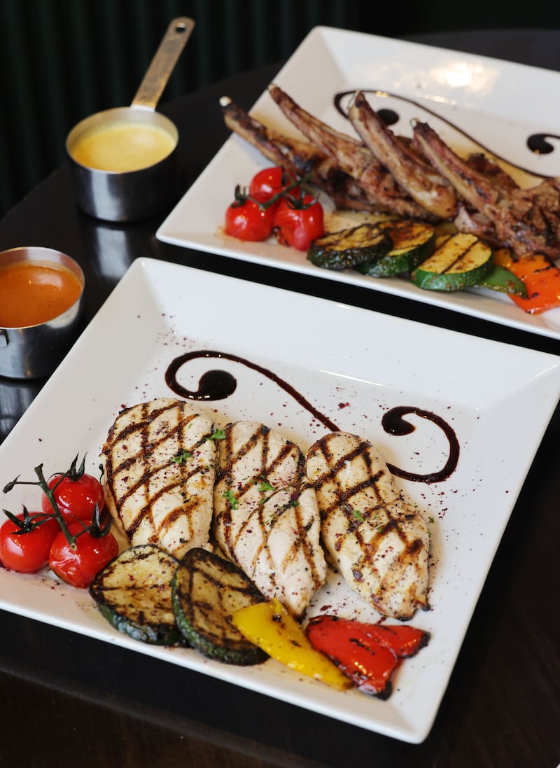 Charcoal-seared chicken and lamb chops