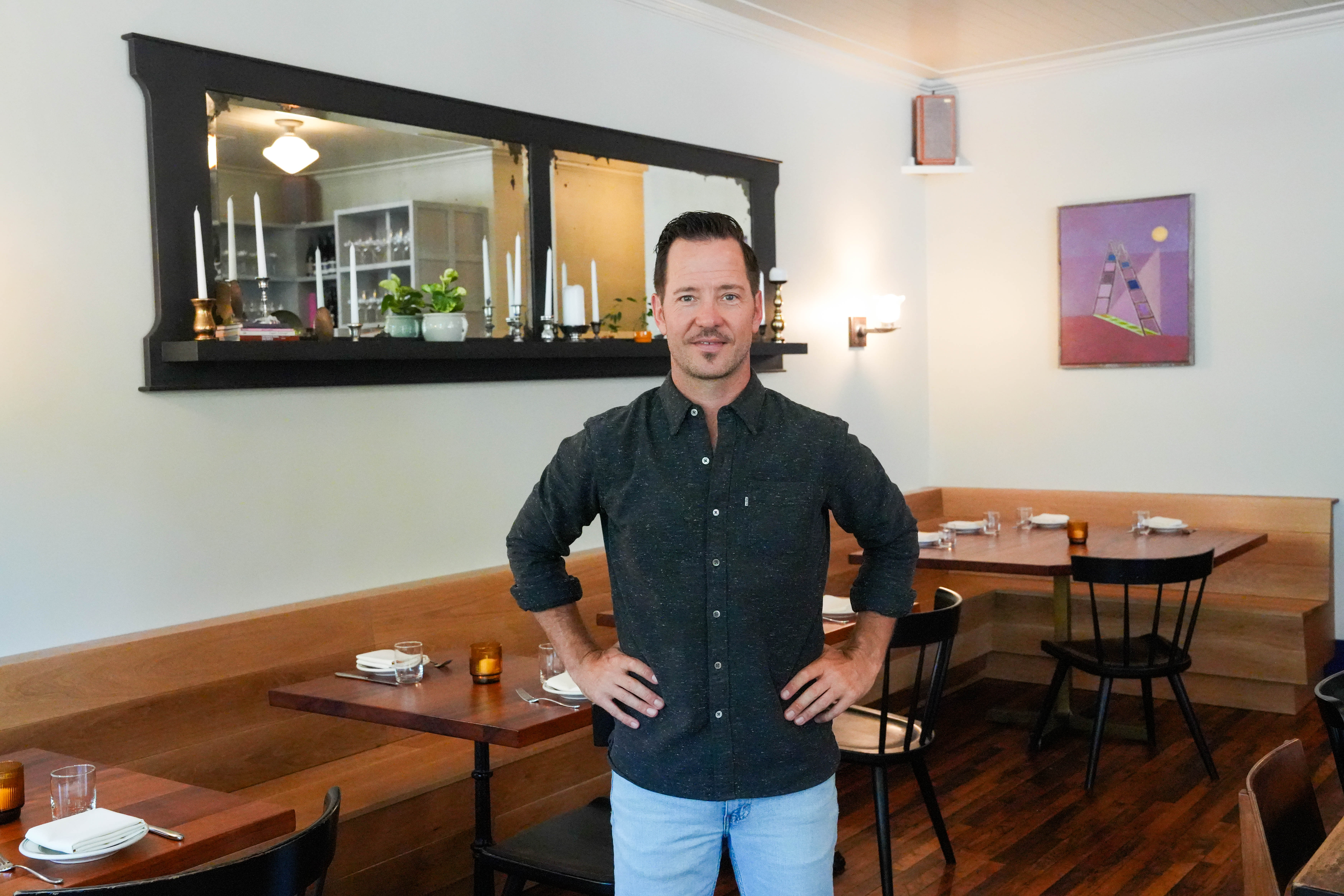 Luke Dirks stands in the dining room of his Southeast Portland restaurant, L'Echelle, on Wednesday, August 13, 2025.