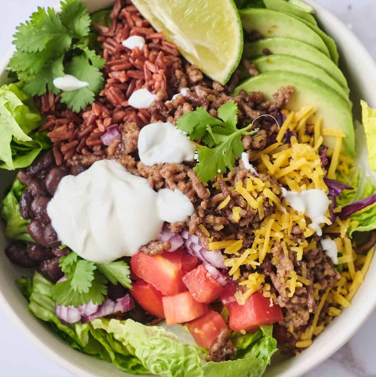 a colorful salad bowl featuring various ingredients for a nutritious meal