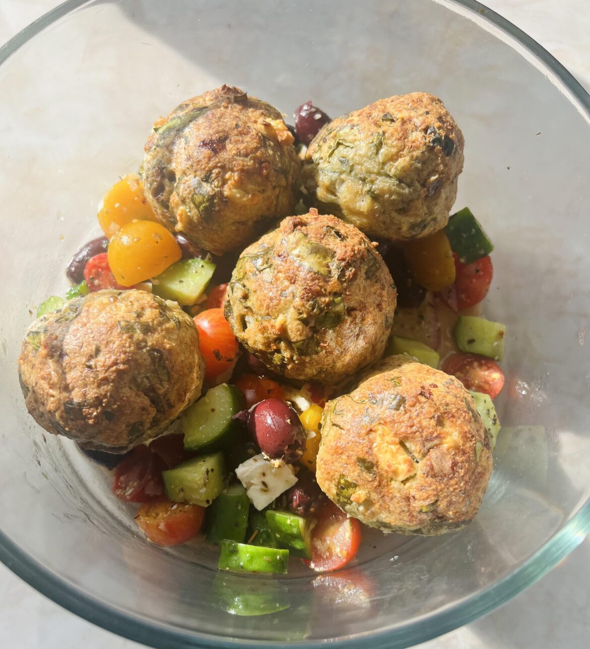 Greek salad and turkey, spinach, feta meatballs. 🥗
