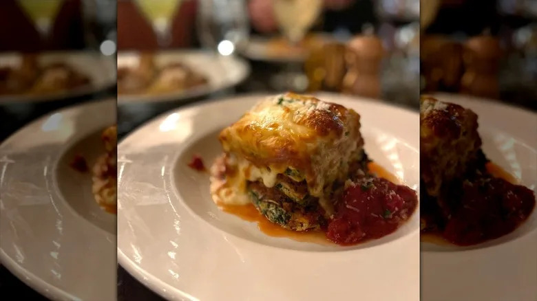 Square lasagna slice on plate