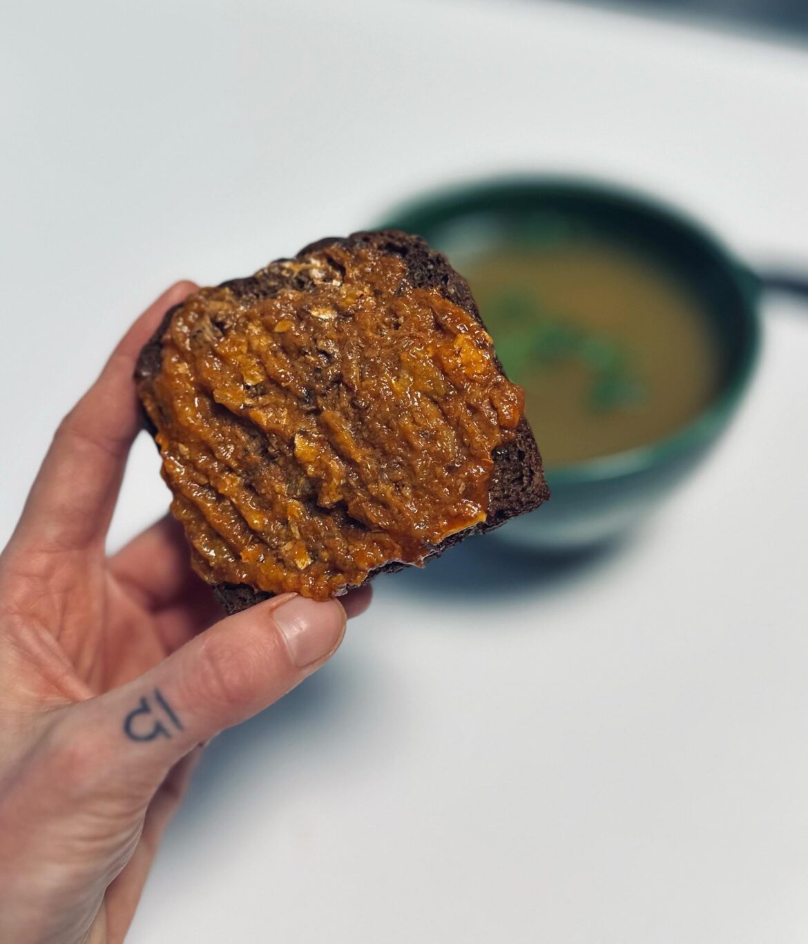 Bread with Baltic herring in tomato sauce