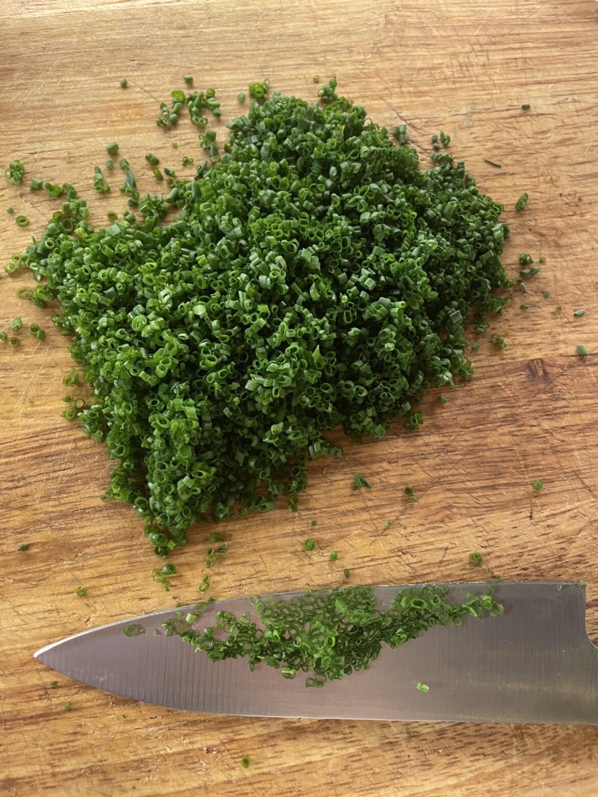 Cutting chives because I have to for work except I’m terrified of the plane guy