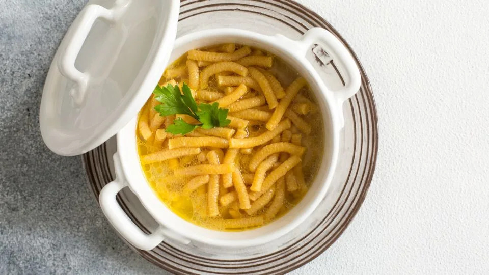 Chef Michele Casadei Massari describes passatelli as “breadcrumbs and Parmigiano Reggiano shaped into tender strands for broth.” - Olga Mazyarkina/iStockphoto/Getty Images