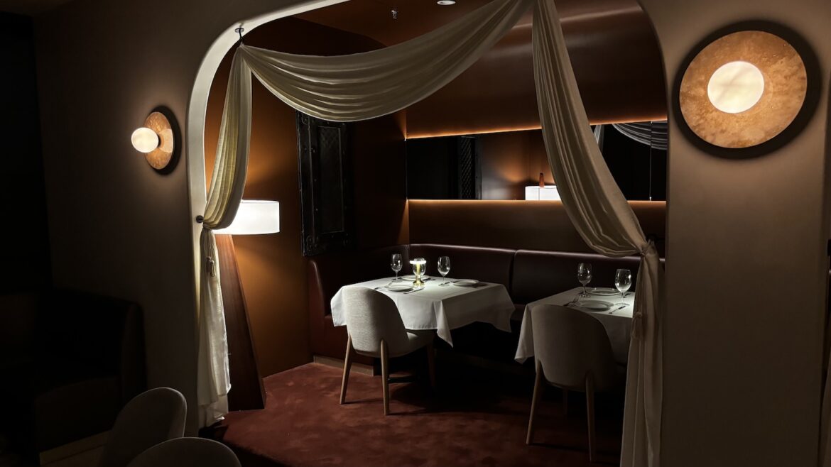 New Mediterranean Restaurant Coming to Uptown Dallas Dimly lit tables and accent lights in Babel's new dining area.