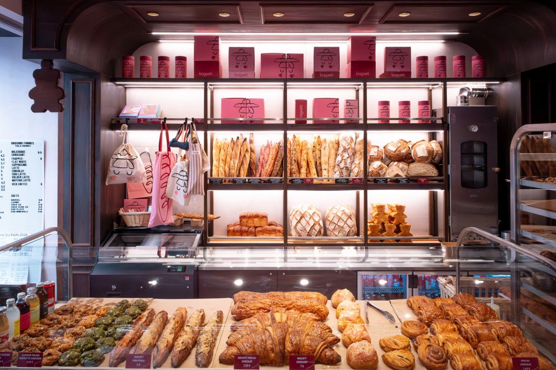 Pink baguettes are among the array of baked goods for sale at baguett. in Paris, a concept store and