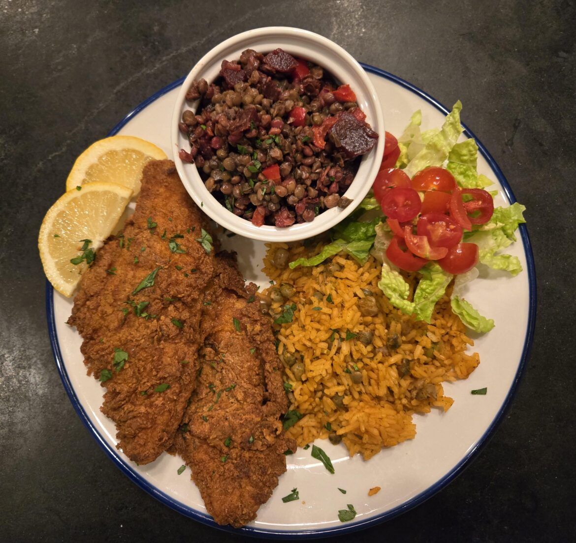Fried fish, beet salad, rice and beans, salad and sleepy time after i eat it